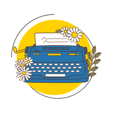 typewriter with flowers growing out of it